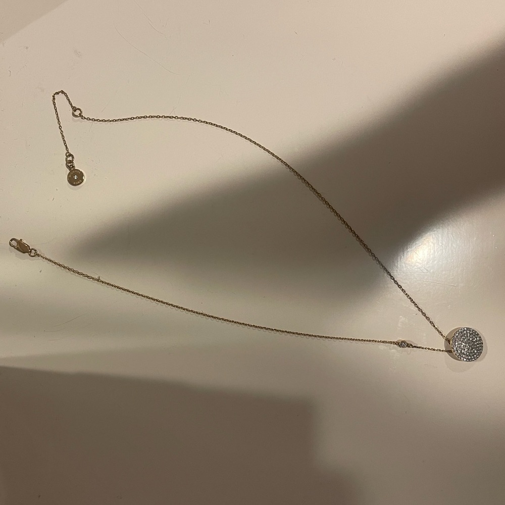 Michael Kors Gold adjustable necklace; beautiful circle pendant